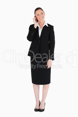 Beautiful woman in suit on the phone Beautiful woman in suit on the phone