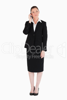 Charming woman in suit on the phone