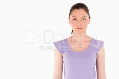 Sad woman posing while standing