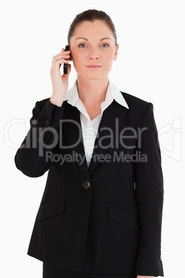 Pretty woman in suit on the phone