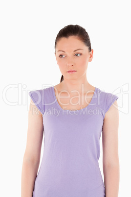 Sad female posing while standing