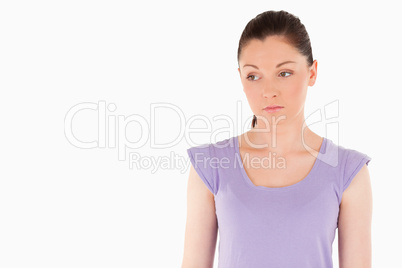 Unhappy woman posing while standing