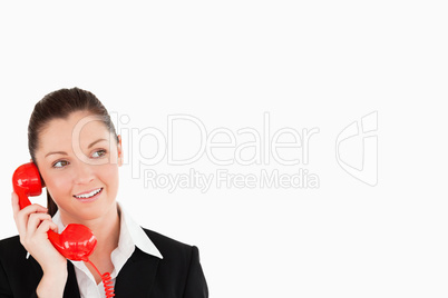 Attractive female in suit on the phone