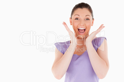 Enthusiastic woman posing while standing