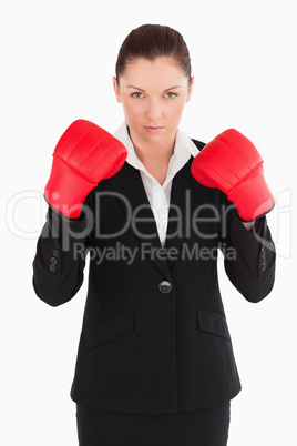 Charming woman wearing some boxing gloves