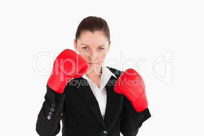 Beautiful woman wearing some boxing gloves