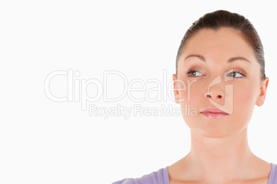 Portrait of a cute woman posing while standing