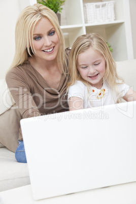 Woman & Girl, Mother and Daughter, Using laptop Computer