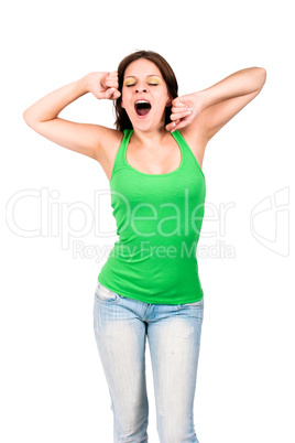 Woman in green top yawning and stretching herself
