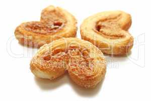 Three sweet cookies on white background