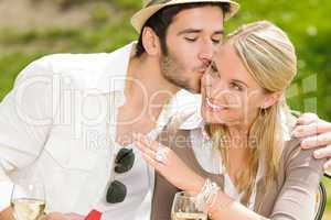 Happy woman receiving wedding ring sunny terrace