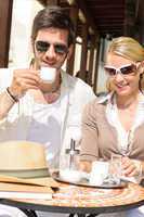 Restaurant terrace elegant couple  drink coffee