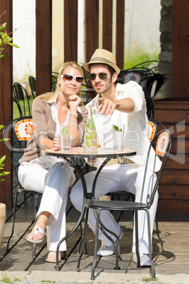 Restaurant terrace elegant couple  drink sunny day