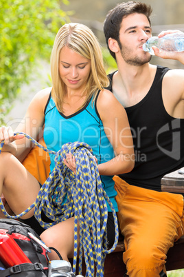 Active young couple climbing gear relax terrace