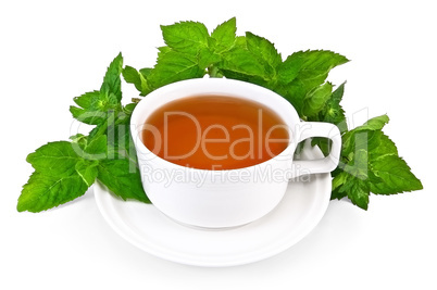 Herbal tea in a white cup with mint