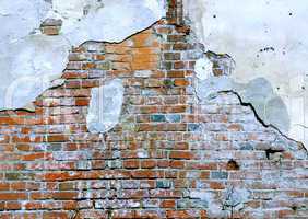 destroyed brick wall