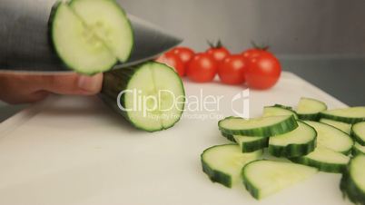 Cutting cucumber salad