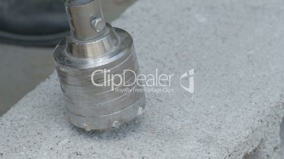 Drilling hole in concrete plank
