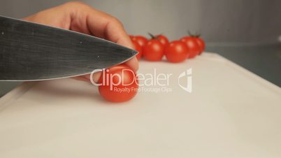 Cutting tomato salad