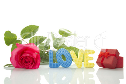 Red Rose, gift box and the text "LOVE"