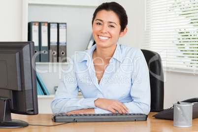 Attractive woman posing while sitting