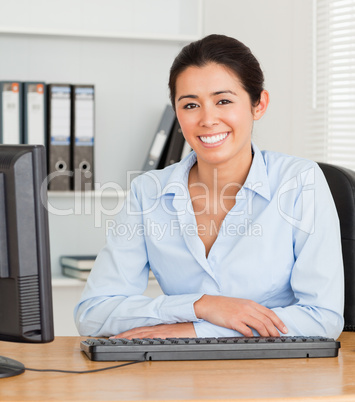 Beautiful woman posing while sitting