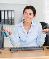 Proud attractive woman posing while sitting