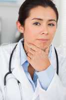 Beautiful female doctor with a stethoscope posing