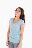 Happy beautiful woman laughing while standing