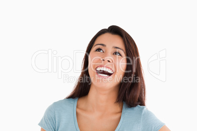 Portrait of a beautiful woman laughing while standing