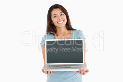 Beautiful woman posing with her laptop