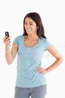 Attractive woman looking at her mobile phone