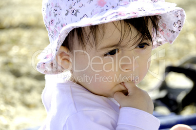 Baby Girl relaxing on the Beach