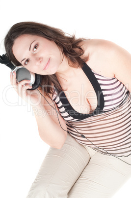 Portrait of pretty pregnant woman listening music