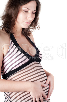 Pregnant woman hands in form of heart sign