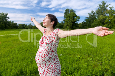 Pregnant woman with closed eyes