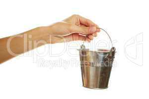 Woman hand with a steel pail