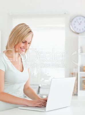 Blonde woman with a laptop