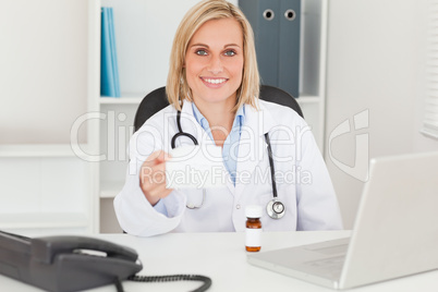 Doctor holding prescription