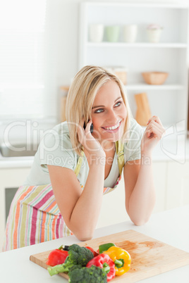 Smiling woman phoning
