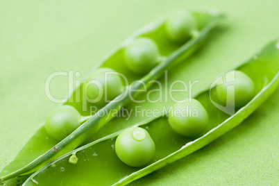 peas on a green background