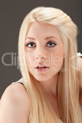 young woman close up studio portrait