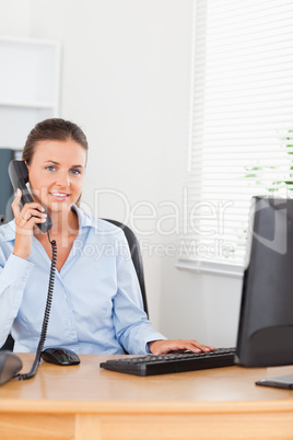 Office worker making a phone call