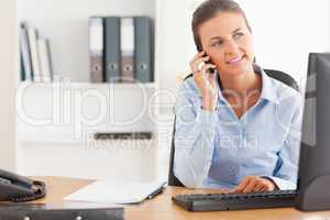 Working woman speaking on the phone