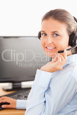 Close up of an office worker with a headset