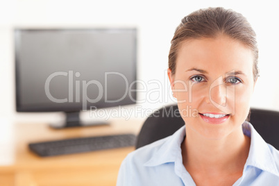 Working woman posing in her office