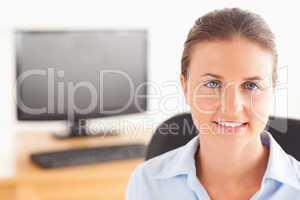 Working woman posing in her office