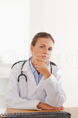 Young female doctor posing