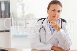 Cute female doctor posing