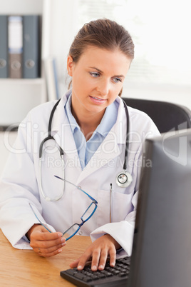 Doctor working on her computer